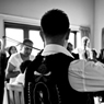 This is an image of a Christos playing the violin at a Stolisma ceremony